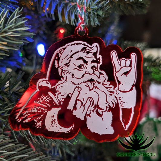 Rocker Santa® “Hail Santa Rocker” acrylic ornament on Christmas tree branch