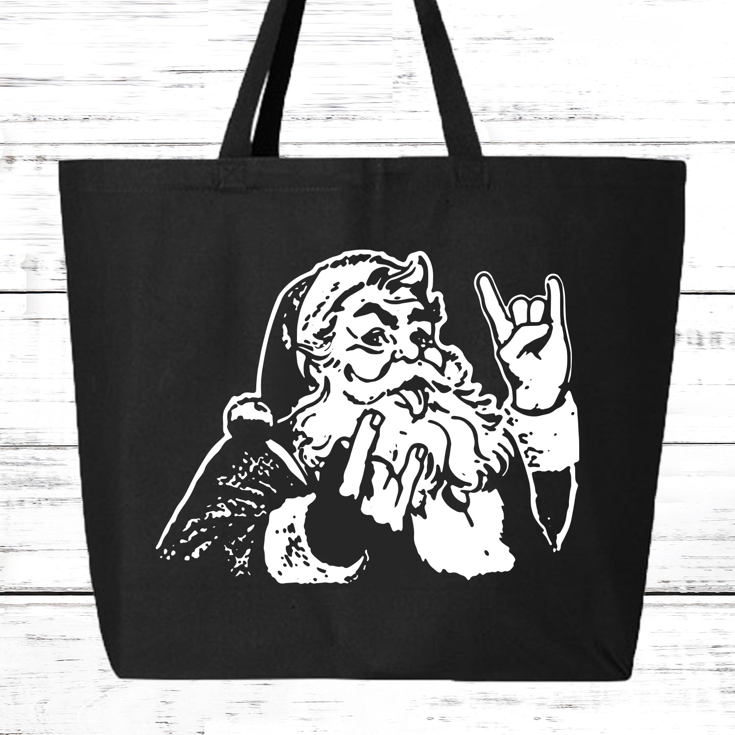 Rocker Santa heavy cotton canvas tote bag with bold Santa rock‑n‑roll graphic